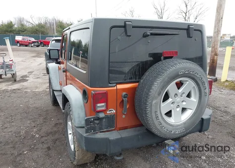 2011 Jeep Wrangler Sport z USA, uszkodzony, nr VIN 1J4AA2D18BL502847